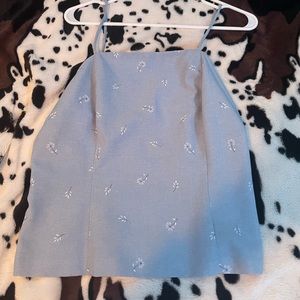 Light blue floral tank top.